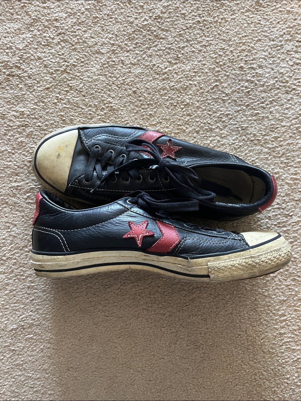 Converse Black Leather Low-Top Sneakers with Red Star Accent